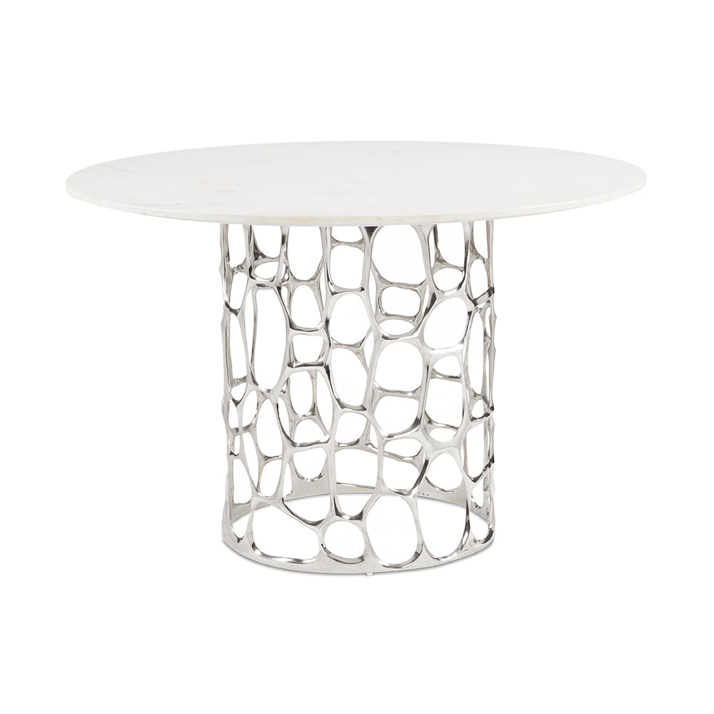 Xcella Mario marble dining table with silver base, showcasing a sleek surface and modern design for kitchen and dining rooms.
