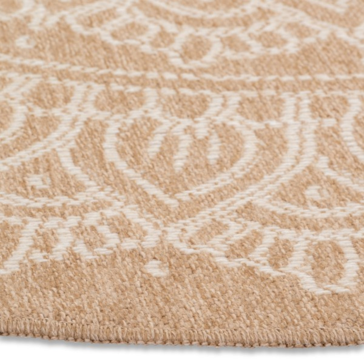 Xcella Avanos round indoor outdoor rug with white pattern, showcasing a woven design suitable for various spaces.